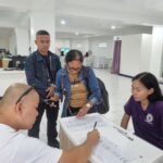 Isang repatriated OFW habang dumadalo sa DMW MIMAROPA Financial Awareness Seminar sa Calapan City Oriental Mindoro